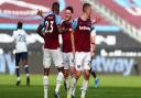 Declan Rice and Issa Diop celebrate West Ham's win over Spurs.