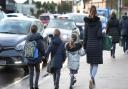 While parents are not allowed to park outside primary schools, the same restrictions do not apply to secondary schools. Picture: Nick Ansell/PA Wire