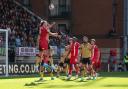 Leyton Orient's Brandon Cooper wins a header against Wrexham. Picture: JAMES MANNING/PA