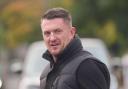 The former English Defence League leader admitted 10 breaches of a High Court order made in 2021 at the start of a hearing at Woolwich Crown Court on Monday.