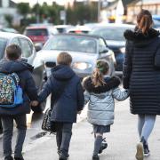 While parents are not allowed to park outside primary schools, the same restrictions do not apply to secondary schools. Picture: Nick Ansell/PA Wire