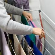 From the burrito method to a little bit of DIY, here are some ways to dry clothes indoors if you live in a smaller home