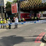A large police cordon has been set up around Sutton Walk by London Waterloo