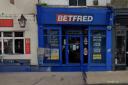 The fascia of Betfred in March High Street caught fire on June 30.