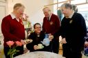 Flood victim William Roberts benefits from the kindness of Maryport Rotarians David Telford, left, Peter Clinning and Rotary president, John Shanks