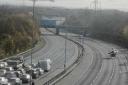 Motorcyclist fighting for life after crash with car on M25