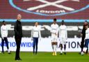 West Ham United manager David Moyes watches his players warm up prior to the Premier League match at the London Stadium, London. Picture date: Sunday February 21, 2021.