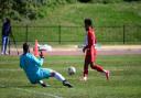 Clapton's Brandon Rooks rounded the Woodford keeper to put his side ahead in the first half.