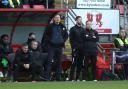 Richie Wellens, Matt Harrold and Paul Terry look on at Brisbane Road