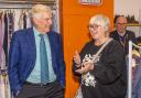 Sir Trevor chats with shoppers at new charity shop