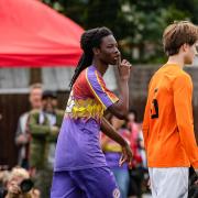 Goal scorer Noah Adejokun celebrates his winner for Clapton CFC