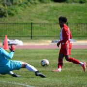 Clapton's Brandon Rooks rounded the Woodford keeper to put his side ahead in the first half.