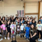 Jesy Nelson (centre) visited Rhodes Theatre School, where she was once a student