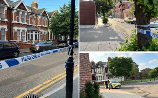 Police have confirmed they have arrested a man after two others were found stabbed in a residential road